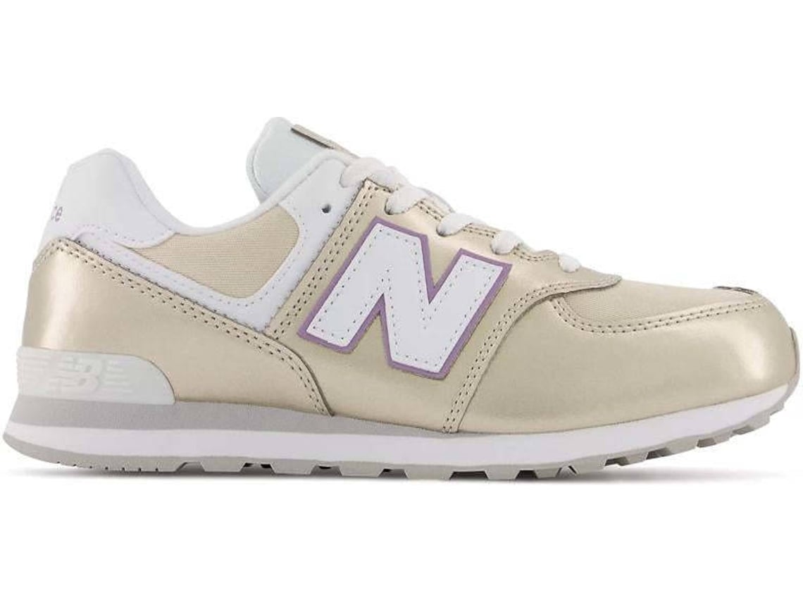 New balance 574 store dourado